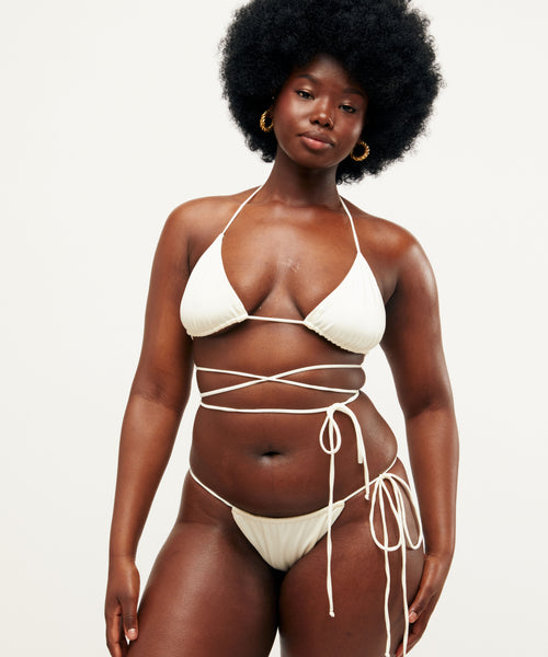 model wearing las olas bikini in avorio